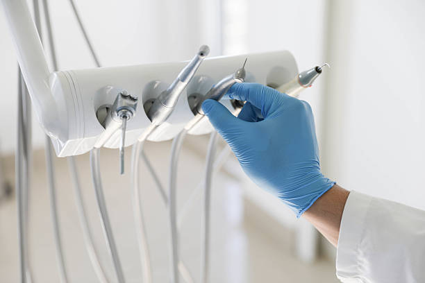 Professional Tooth Extraction technician working in Bayou Blue, LA